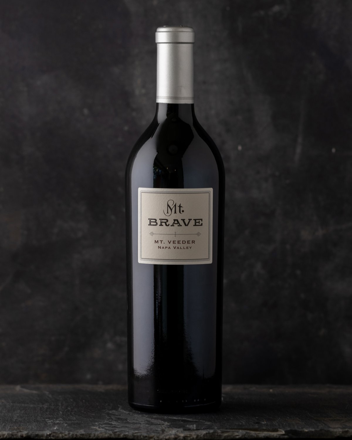 Mt. Brave Bottle of wine against a dark background